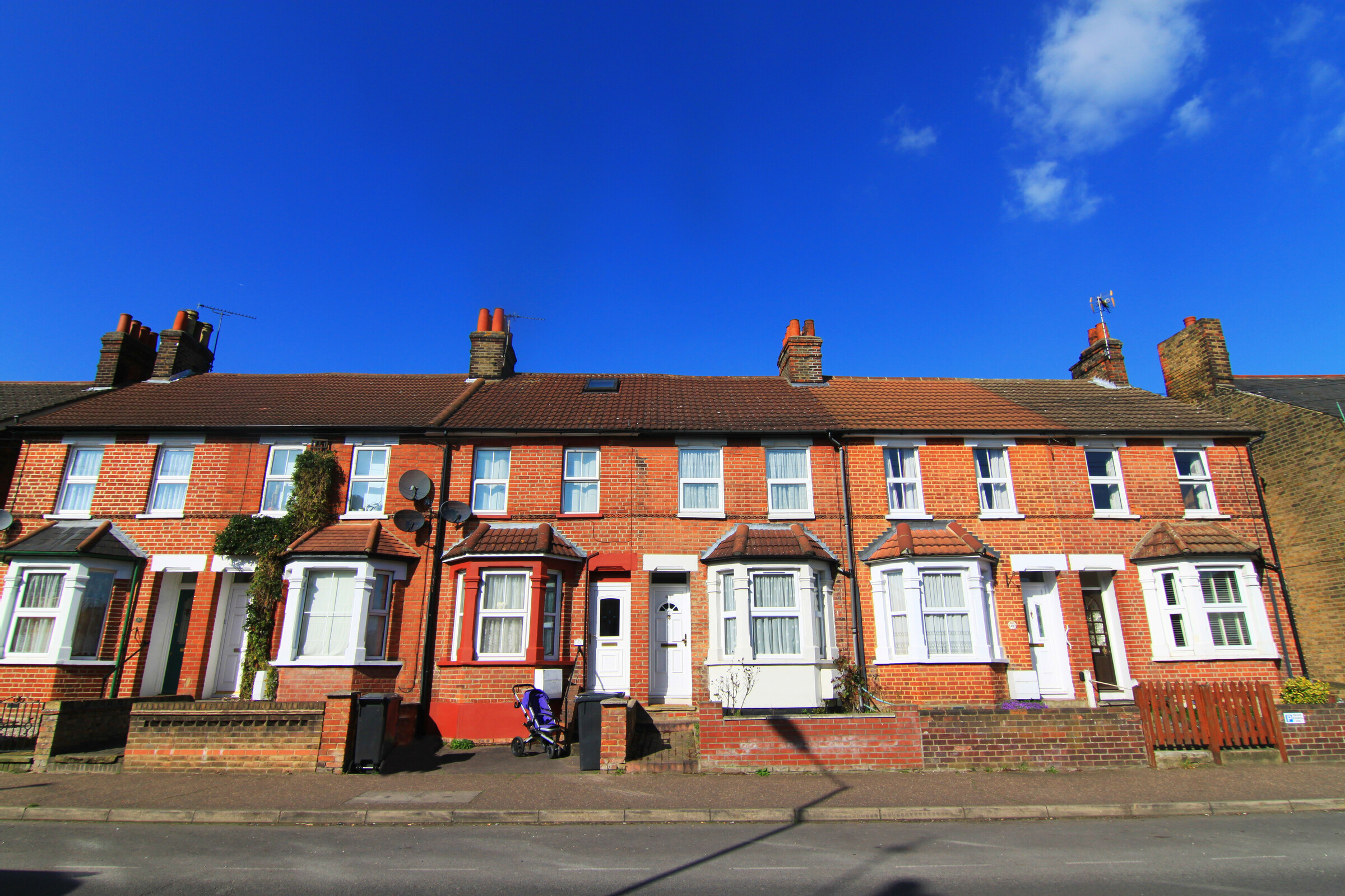 English terraced house with lovely blue sky in spring